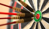 Darts in dart board image